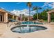 Backyard pool and spa, perfect for relaxing with views of palm trees and lush landscaping at 3835 E Leland St, Mesa, AZ 85215