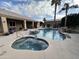 Inviting pool and spa with waterfall feature and ample patio space at 3835 E Leland St, Mesa, AZ 85215