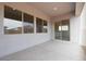 Covered patio offers an outdoor living space, complete with multiple windows at 3909 E Gold Mountain Ave, San Tan Valley, AZ 85143