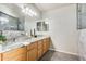 Bathroom with double sinks and granite countertops at 9131 W Albert Ln, Peoria, AZ 85382