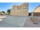 Two-story house with a double-car garage at 9131 W Albert Ln, Peoria, AZ 85382