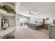 Large main bedroom with a comfortable bed and built-in shelving at 9131 W Albert Ln, Peoria, AZ 85382