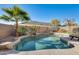 Relaxing kidney shaped pool with waterfall feature at 9131 W Albert Ln, Peoria, AZ 85382