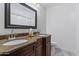 Bathroom with double vanity and granite countertops at 12130 N 70Th Ave, Peoria, AZ 85345