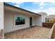 Modern front entry with dark-green door and stylish stone flooring at 12130 N 70Th Ave, Peoria, AZ 85345