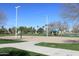 Sand volleyball court with surrounding landscaping at 1449 W Iris Dr, Gilbert, AZ 85233