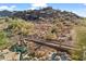 Aerial view of backyard, landscaping, and rock waterfall at 20436 N 17Th Pl, Phoenix, AZ 85024