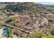 Aerial view of property showing desert landscape, pool, and mountain views at 20436 N 17Th Pl, Phoenix, AZ 85024