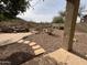 Desert-landscaped backyard featuring a cascading water feature, stepping stones and mountain views at 20436 N 17Th Pl, Phoenix, AZ 85024