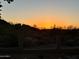 Desert landscape and sunset view from the backyard, behind a fence at 20436 N 17Th Pl, Phoenix, AZ 85024