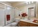 Cozy bathroom with shower, bathtub, and traditional style at 20436 N 17Th Pl, Phoenix, AZ 85024