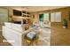 Cozy, staged living room featuring a fireplace, modern decor, and a slider to backyard at 20436 N 17Th Pl, Phoenix, AZ 85024