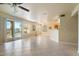 Bright living room featuring tile floors, neutral paint, and sliding door access to backyard at 20436 N 17Th Pl, Phoenix, AZ 85024