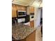 Kitchen features granite countertops and stainless steel appliances at 3325 W Belmont Ave, Phoenix, AZ 85051