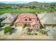 Luxury home with tile roof, situated on a golf course community at 34704 N 93Rd Pl, Scottsdale, AZ 85262