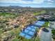 Community view with tennis courts, pool, and mountain backdrop at 34704 N 93Rd Pl, Scottsdale, AZ 85262