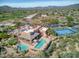 Community pool and tennis courts with desert landscape at 34704 N 93Rd Pl, Scottsdale, AZ 85262