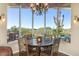 Charming breakfast nook with a round table and views at 34704 N 93Rd Pl, Scottsdale, AZ 85262