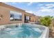 Soothing hot tub with bubbling water, located near pool at 34704 N 93Rd Pl, Scottsdale, AZ 85262