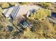 Lush desert trees surround this sprawling tile roof home at 37615 N Tranquil Trl, Carefree, AZ 85377