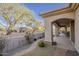 Beautiful desert backyard featuring covered patio and scenic desert landscaping at 37615 N Tranquil Trl, Carefree, AZ 85377