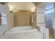 Bathroom featuring a luxurious soaking tub with natural lighting and a separate shower at 37615 N Tranquil Trl, Carefree, AZ 85377