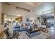 Open-concept living room, showcasing a seamless flow into the gourmet kitchen at 37615 N Tranquil Trl, Carefree, AZ 85377