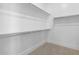 Walk-in closet with ample shelving and space to organize all your clothes and accessories at 42140 N Golden Trl, San Tan Valley, AZ 85140