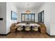 Bright breakfast nook with built-in seating and a stunning chandelier at 6229 E Gold Dust Ave, Paradise Valley, AZ 85253