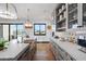 Kitchen features a farmhouse sink and custom cabinetry at 6229 E Gold Dust Ave, Paradise Valley, AZ 85253