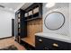 Stylish mudroom with built-in bench, storage, and hooks at 6229 E Gold Dust Ave, Paradise Valley, AZ 85253