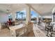 Outdoor kitchen with built-in appliances and seating area at 6229 E Gold Dust Ave, Paradise Valley, AZ 85253