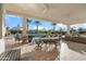 Covered patio overlooking a refreshing pool and lush landscaping at 6229 E Gold Dust Ave, Paradise Valley, AZ 85253