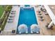 Large rectangular pool with multiple lounge chairs and umbrellas at 6229 E Gold Dust Ave, Paradise Valley, AZ 85253