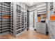 Large walk-in closet with ample shelving and drawers at 6229 E Gold Dust Ave, Paradise Valley, AZ 85253