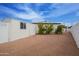 Backyard view with shed and flowering plants at 1721 S Shafer Dr, Tempe, AZ 85281