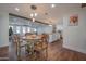 Open concept dining area with a white kitchen and wooden table at 1721 S Shafer Dr, Tempe, AZ 85281