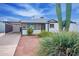 Bright white single story home with modern carport and desert landscaping at 1721 S Shafer Dr, Tempe, AZ 85281