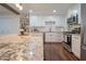 Granite countertop kitchen island anchors this bright and airy kitchen at 1721 S Shafer Dr, Tempe, AZ 85281