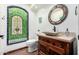 Charming bathroom with ornate vanity and decorative tile at 26223 N Bravo Ln, Rio Verde, AZ 85263