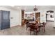 Kitchen dining area with a round table and four leather chairs at 26223 N Bravo Ln, Rio Verde, AZ 85263