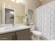 Bathroom with single vanity, toilet, and shower/tub at 30636 N Royal Oak Way, San Tan Valley, AZ 85143