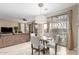 Casual dining area with sliding glass doors to the backyard at 30636 N Royal Oak Way, San Tan Valley, AZ 85143