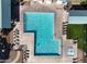 Community pool with spa and lounge chairs at 30636 N Royal Oak Way, San Tan Valley, AZ 85143