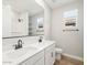 Modern bathroom featuring double sink vanity, large mirror, shower, and toilet at 4820 N 177Th Dr, Goodyear, AZ 85395