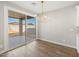 Dining area with sliding glass doors leading to the outdoor patio and backyard at 4820 N 177Th Dr, Goodyear, AZ 85395