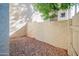 Small backyard with gravel and a gated side yard at 7625 E Camelback Rd # B116, Scottsdale, AZ 85251