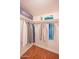 Well-organized closet with shelves and hanging rods at 7625 E Camelback Rd # B116, Scottsdale, AZ 85251