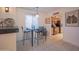 View of kitchen and dining area with breakfast bar at 7625 E Camelback Rd # B116, Scottsdale, AZ 85251