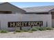 Hurley Ranch community sign, with landscaping, inviting you to your new home at 8657 W Warner St, Tolleson, AZ 85353